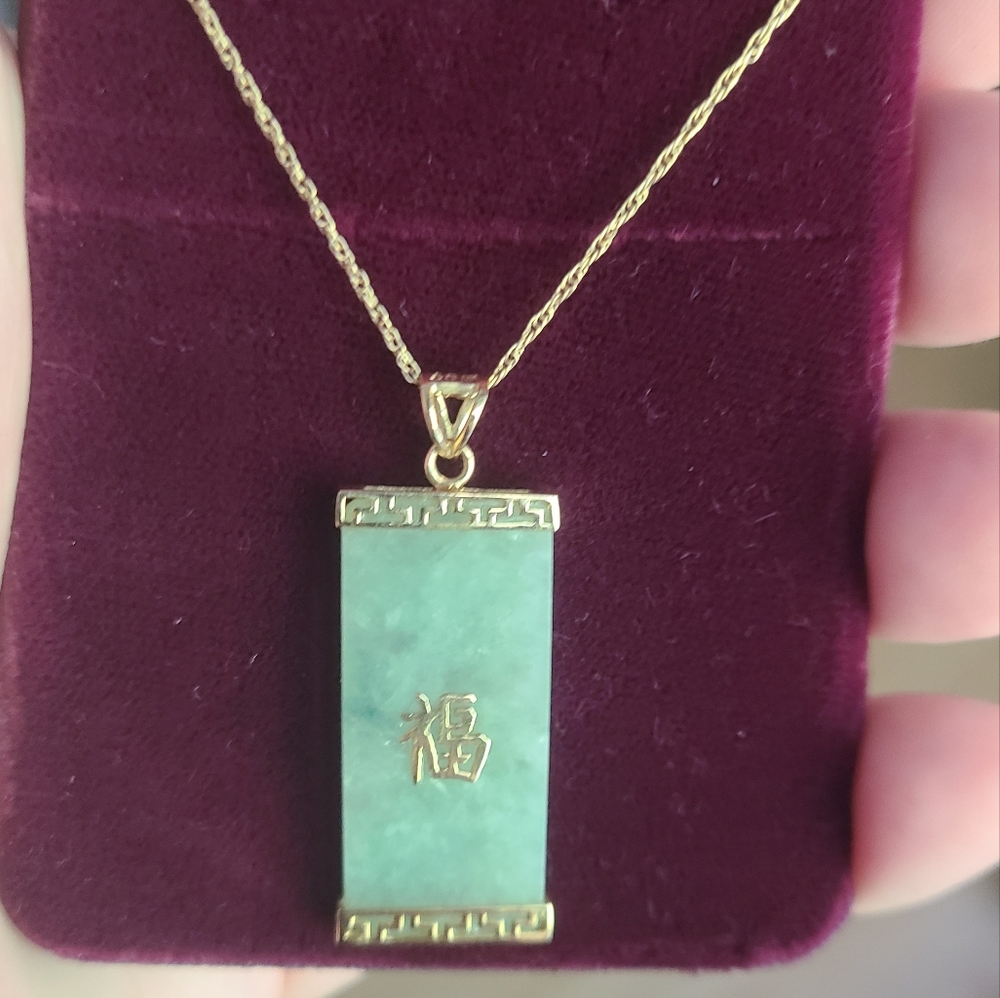 14kt gold jade Chinese pendant like and blessing